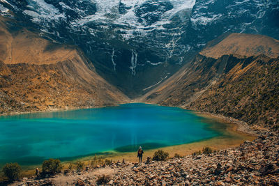 Scenic view of lake and mountains during winter