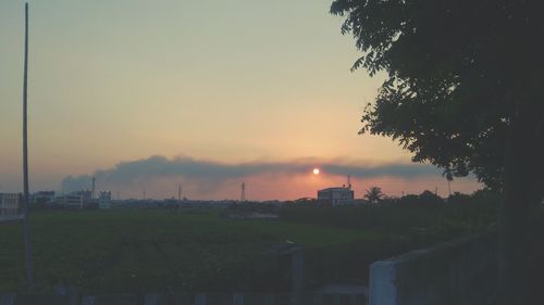 Scenic view of landscape at sunset