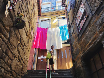 Man hanging in the backstreets of porto