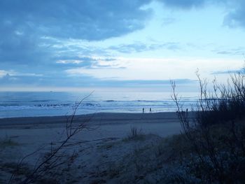 Scenic view of beach against sky
