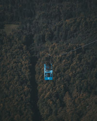 High angle view of hanging from window against sky