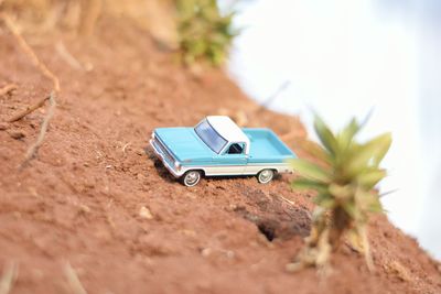 Close-up of toy car on road