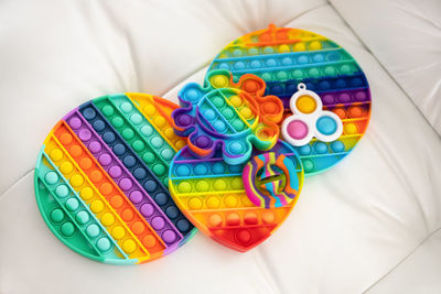 High angle view of multi colored candies on table