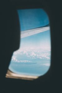 Reflection of woman on glass window