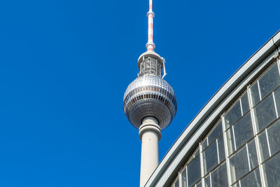 Low angle view of building against blue sky