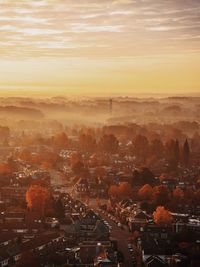 High angle view of cityscape during sunset