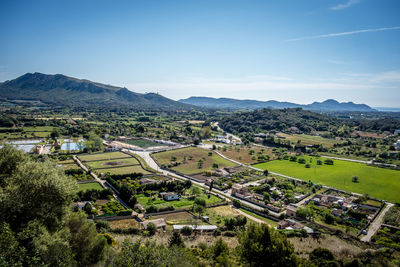 High angle view of buildings in city against sky