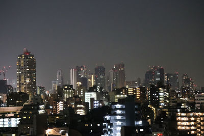 Illuminated cityscape at night