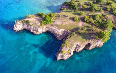 High angle view of rocks in sea