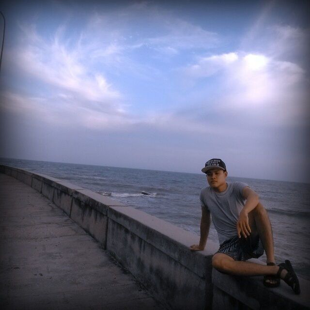 sea, lifestyles, full length, leisure activity, casual clothing, water, horizon over water, sky, person, childhood, beach, standing, shore, elementary age, sitting, boys, young adult, girls