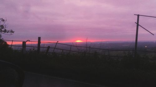 Scenic view of landscape against sky during sunset