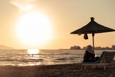 Scenic view of sea against sky during sunset