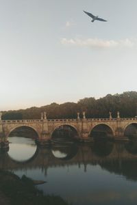 Arch bridge over river