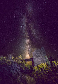 Low angle view of stars in sky at night