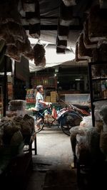 People working at market stall