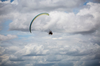 Low angle view of kite flying in sky