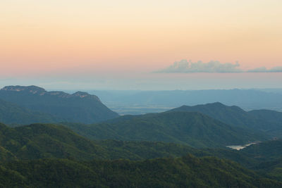 Scenic view of mountains against sky during sunset