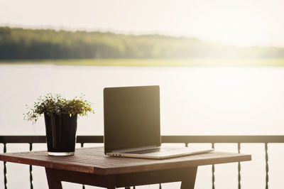 Scenic view of table by lake