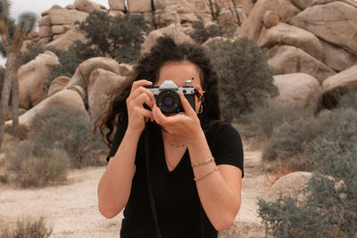 Portrait of man photographing