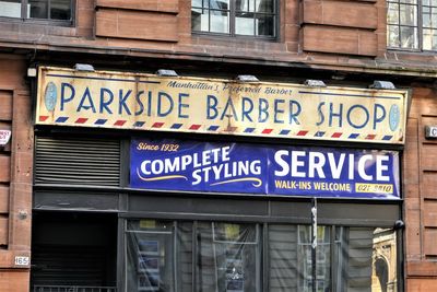 Low angle view of information sign on building