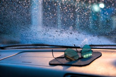 Close-up of wet car window