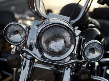 Close-up of motorcycle headlights