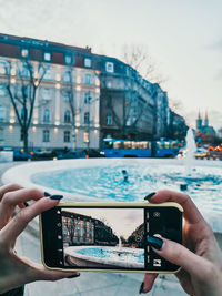 Man photographing cityscape