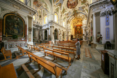 Rear view of people in temple building