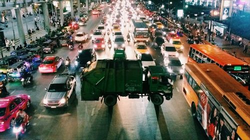 Cars on road in city at night