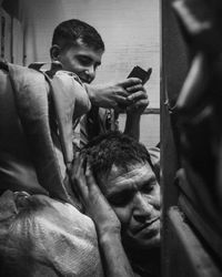 Portrait of man photographing