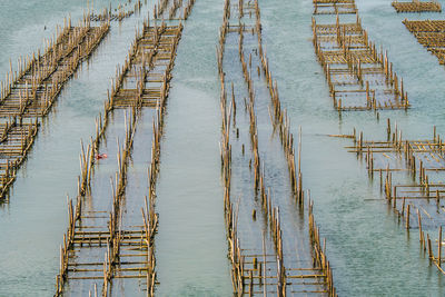 High angle view of wooden structure in lake