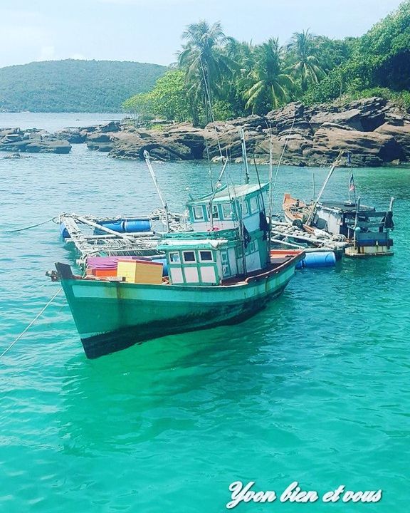 nautical vessel, transportation, mode of transport, sea, water, moored, day, nature, beach, outdoors, scenics, no people, mountain, beauty in nature, longtail boat, sky