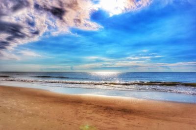 Scenic view of beach against sky