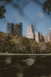 View of city buildings against sky