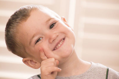 Close-up portrait of smiling boy