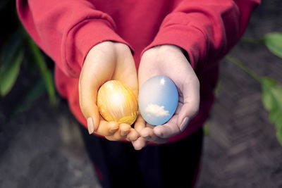 Concept conserve ester eggs in hand