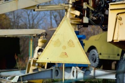 Close-up of yellow sign