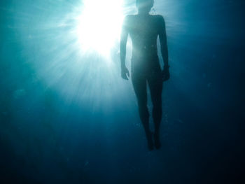 Man swimming in sea