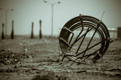 Abandoned shopping cart on field