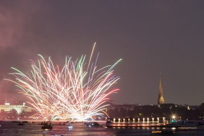 Firework display at night