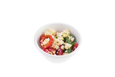 Close-up of salad in bowl against white background