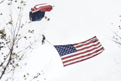 Low angle view of flag against clear sky