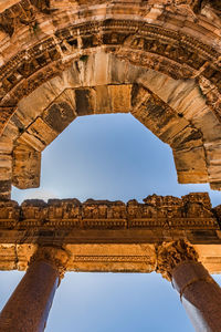 Low angle view of old ruin against clear sky