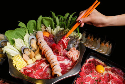 Midsection of person preparing food