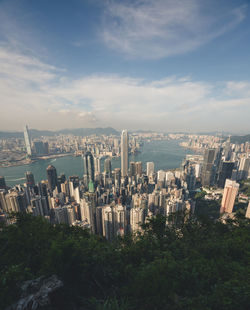 High angle view of buildings in city against sky