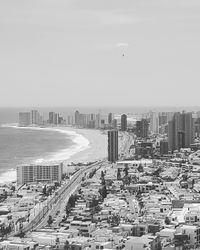 Aerial view of cityscape against clear sky