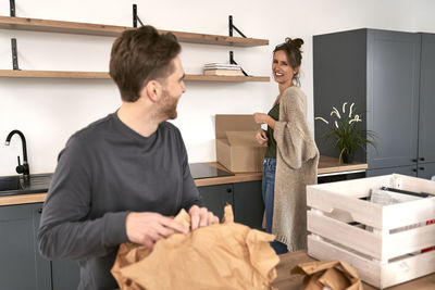 Side view of man working at home