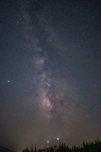 Low angle view of stars in sky at night