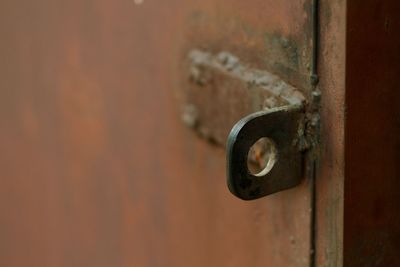 Close-up of rusty door knocker