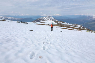 Scenic view of snowcapped mountain against sky